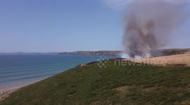 Dramatic drone footage shows large gorse fire at popular UK beach