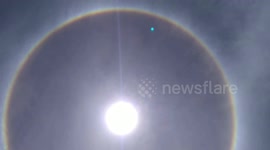 Mesmerising solar halo rainbow appears in clear skies over the Philippines