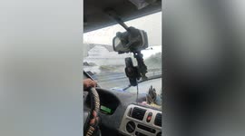 Motorist improvises DIY windscreen wiper after storm destroys old blades