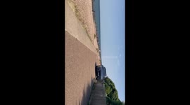 Sunseekers soak up hot weather on beach in Whitstable in record heat to cool off