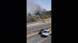 Fire erupts next to highway in Dartford as 40-degree temperatures recorded in UK