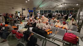 Palestinian muslim pilgrims travel through Prince Muhammad bin Abdulaziz International Airport