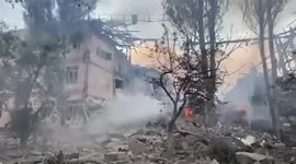 Smoke clears after Russian shells destroy school in Donetsk
