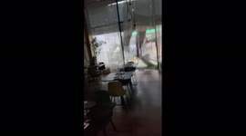 Debris slams into restaurant as powerful storm lashes Panama City