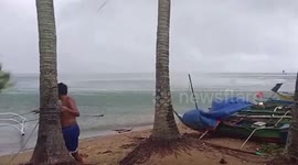 Waterspout tornado slams into homes as it moves onto land in the Philippines
