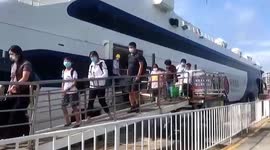 Hundreds of stranded tourists escorted out of locked down resort city in China