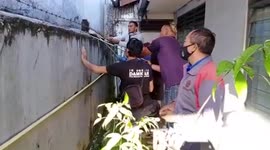 Massive python hauled from terrified family's yard in Indonesia