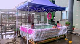 Chinese father uses bamboo to build swimming pool for children