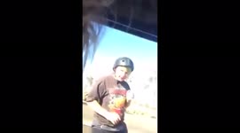 Kid tries to do a wheelie but falls