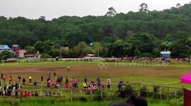 Police fire warning shots to disperse football players fighting during match in Myanmar