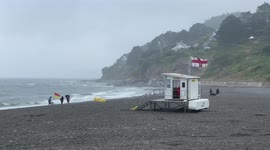 Wind and rain leave Cornish beach deserted on first weekend of UK summer holidays