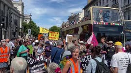 Protesters block Parliament Square during a climate and cost of living march