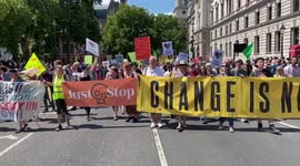 Protesters block Parliament Square during a climate and cost of living march