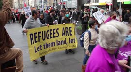 ‘Justice for Refugees’ protesters march in Sydney demanding permanent visas for all