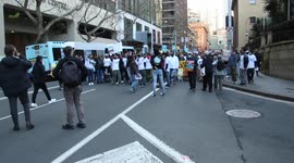 ‘Justice for Refugees rally - Permanent visas for all’ – protesters march in Sydney, Australia
