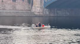 Pet border terrier rides boat while barking at passing cars in Nottingham