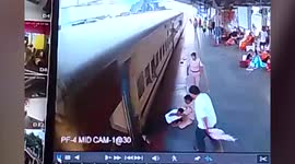 Cops rescue man who slips while boarding train in India