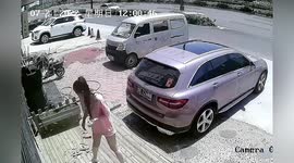 Cast stones fall off shop, injuring woman in China