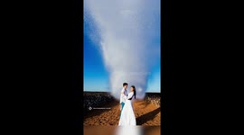 Newlyweds doused by water dropped from plane in sensational photoshoot