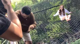 Terrified groom battles through his fear of heights for prenup shoot on 'spider web' net