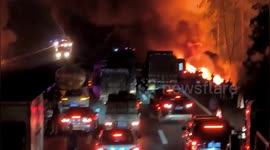 Huge fire erupts after trucks collide, killing 1 in southern China