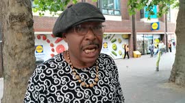 A Nigerian guy very upset. You can buy alcohol legally but you can't drink it here? London, UK