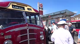 Passengers swap retro coaches at Hammersmith on a trip around London to celebrate 90 years of Victoria Coach Station