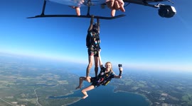 Uplifting, but not in that way: Daredevil woman jumps from HELICOPTER