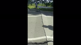 Huge cracks appear in road after 7.0-magnitude earthquake hits the Philippines