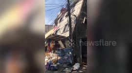 Philippines earthquake sends frantic shoppers fleeing from market