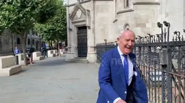 British billionaire Sir Frederick Barclay arrives at court in London with jump for photographers