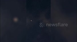 UK doctor left baffled after filming two bizarre UFOs floating above his home