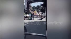 Strong magnitude 7 earthquake causes building to tip over in the Philippines