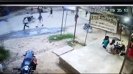 Watch - Biker mauled down by two fighting bull , locals ran to rescue