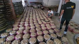 Palestinian vendors prepare sweets ahead of high school exams