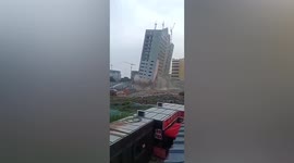 Huge 17-storey building crashes to ground in seconds during demolition in China