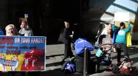 Ukrainians and supporters protest at Atlassian office in Sydney as they continue to do business in Russia