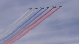 Fighter jets spread out tricolour of Russian Flag at the General rehearsal for Navy Day in St Petersburg, Russia