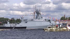 Warships and fighter jets paraded through St Petersburg on Russia's Navy Day