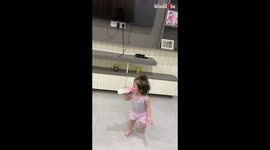 'Cute girl gives her father a warm, pleasant welcome
'