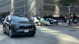 Vehicle flipped over during collision in Downtown Houston