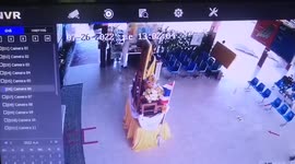 Quick-thinking tourist dodges out-of-control car crashing through bus station