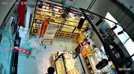 Wind shatters shop's glass door just moments after children were playing with it