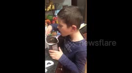 Boy Spits Out Cocoa