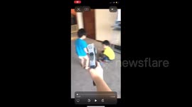 Boy Shoots Toy Gun At Friends