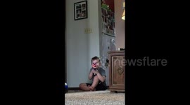 Boy Shoots Toy Gun at Sister