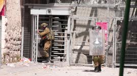Palestinian hurl stones towards Israeli forces during clashes