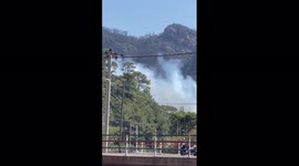 Firefighters battle to control blaze near resort town in south-western Turkey