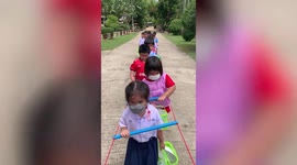 Teacher uses rope ladder to keep her pupils together at break times