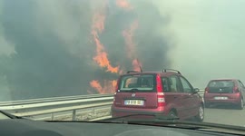 Drivers' lucky escape as they pass out of control wildfire near Marseille, France